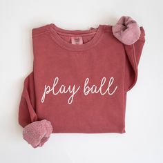 Play ball: this baseball sweatshirt says it all! Crewneck play ball sweatshirt is perfect for baeball moms, baseball dad, baseball teams, and more! Baseball Sweatshirt Play Ball Sweatshirt for Baseball Team Sweatshirt Baseball Mom Gift Idea Baseball Mom Sweatshirt T-Ball Sweatshirt 𝐏𝐑𝐎𝐃𝐔𝐂𝐓 𝐃𝐄𝐓𝐀𝐈𝐋𝐒 * 80% ring-spun cotton, 20% polyester * Medium-heavy, garment-dyed fabric * Unisex, crewneck sweatshirt (*Please refer to the size chart in listing images to ensure correct fit; size up for a slouchier fit) * Relaxed fit * Comfort Colors brand 𝐇𝐎𝐖 𝐓𝐎 𝐎𝐑𝐃𝐄𝐑 * Select your desired sweatshirt color * Select your size (*Please refer to the size chart in the listing images to ensure correct fit) * Click Add to Cart * If you'd like to purchase more than one sweatshirt, repeat thi Baseball Mom Sweater, White Baseball Season Sports Sweatshirt, Baseball Mom Gift Ideas, Trendy Crew Neck T-shirt For Baseball Season, Baseball Season Cotton Fan Apparel Sweatshirt, Mom Baseball Sweatshirts, Baseball Mama Sweatshirt, Baseball Mom Outfits, Baseball Mom Gifts