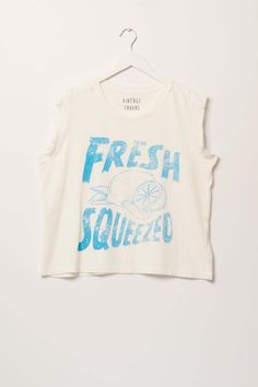 Fresh Squeezed Vintage-Print Sleeveless Graphic Tee - ShopPromesa Spring Graphic Tank Top With Screen Print, Acid Wash Graphic Print Muscle Tee With Crew Neck, Casual Distressed Muscle Tee For Summer, Summer Graphic Muscle Tee With Screen Print, Summer Short Sleeve Muscle Tee With Screen Print, Summer Muscle Tee With Screen Print And Short Sleeves, Summer Muscle Tee With Screen Print, Acid Wash Cotton Tank Top With Graphic Print, Spring Graphic Print Muscle Tee