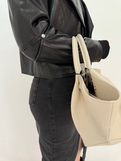 Indulge in luxury while staying true to your values with Adroit Atelier's Ninon Vegan Leather Jacket in Black. Made from super soft vegan leather, this jacket is a timeless and versatile piece that pairs perfectly with any outfit. Its cropped length adds an edgy touch to your look, while the unique elbow detail adds a distinctive flair. Elevate your outerwear collection with this jacket that is both stylish and ethical! Fabrication: 100% PU shell, 100% Poly Spandex lining Details: - Cropped jack Evening Jewelry, Vegan Leather Jacket, Your Values, Leather Jacket Black, Sweater Sale, Jacket Sale, Denim Pant, Skirts For Sale, Denim Dress