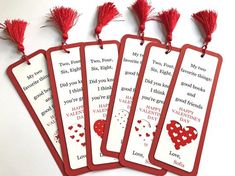 four valentine's day bookmarks with red tassels