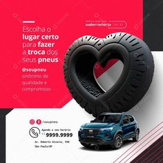 a blue truck parked next to a giant tire in the shape of a heart on a black and white background