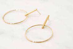 W H A T ∙ M A K E S ∙ T H I S ∙ S P E C I A L Simple but striking, these Minimal Large Circle & Stick Stud Earrings are minimal in design but big on impact. - we use only the finest quality materials - all components are 100% sterling silver or 18k Gold plated (Nickel free) - all pieces are designed in our happy studio D E T A I L S * Available in sterling silver or Crafted in Gold plated .925 sterling silver * Encrusted with zircon stones * Price is per pair * Very easy to put on All jewelr Modern Gold Hoop Linear Earrings, Minimalist Round Linear Earrings For Everyday, Modern Gold Open Circle Earrings, Minimalist Pierced Open Circle Earrings, Minimalist Open Circle Pierced Earrings, Gold Minimalist Open Circle Earrings, Minimalist Gold Open Circle Earrings, Modern Round Linear Earrings For Everyday Wear, Modern Round Linear Earrings For Everyday