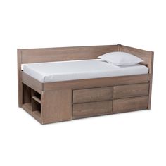 a bed with two drawers underneath it and a pillow on the top of one drawer