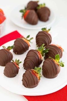 chocolate covered strawberries on a white plate