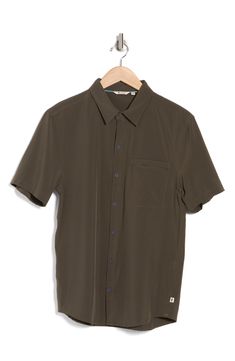 Cool and collected, this short-sleeve button-up shirt is made from an anti-static fabric and makes the ideal base for versatile outfits. 29 1/4" length (size Medium) Front button closure Spread collar Short sleeves 86% recycled polyester, 14% spandex Machine wash, tumble dry Imported Outdoor Camp Shirt With Short Sleeves, Short Sleeve Camp Shirt With Button Closure For Outdoor, Outdoor Camp Shirt With Button Closure And Short Sleeves, Outdoor Short Sleeve Tops With Button Closure, Short Sleeve Tops With Button Closure For Outdoor, Outdoor Collared Short Sleeve Shirt With Button Closure, Workwear Tops With Functional Buttons And Short Sleeves, Casual Short Sleeve Button-up Shirt For Outdoor, Casual Button-up Short Sleeve Shirt For Outdoor