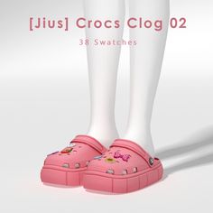 a pair of pink shoes with bows on them and the words jusu crocs clog 02