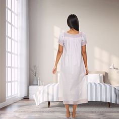 Step into a world of timeless elegance with the Alexander Del Rossa 100% Cotton Victorian Nightgown. This exquisite piece is crafted from premium cotton, ensuring breathability and comfort against your skin. Perfect for relaxed evenings at home, its vintage design adds a touch of sophistication that makes it suitable even when you have guests.

- Material: 100% Cotton
- Color: Pearl
- Size: Medium
- Gender: Female
- Features: Gathered short sleeves with wide lace cuffs, neckline trimmed with wid Feminine Cotton Nightgown For Loungewear, Elegant Cotton Sleepwear For Home, Feminine Cotton Nightgown For Sleepovers, Elegant Cotton Nightgown For Sleepover, Cotton Lace Trim Nightgown For Home, Cotton Nightgown With Lace Trim For Home, Feminine Short Sleeve Nightgown For Home, Feminine Cotton Nightgown For Hospital, Elegant Cotton Nightgown For Bedtime