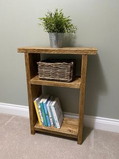 a wooden shelf with books and a basket on top