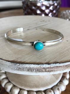 This simple cuff adds just a bit of turquoise to your stack! Great with our Simple Turquoise Rings!!! Handmade by Merle House Choose from Royston or Kingman Turquoise Signed and Stamped Rings Handmade, Royston Turquoise, Turquoise Cuff, Turquoise Rings, Kingman Turquoise, Cuff Bracelet, Cuff Bracelets, Cuff, Turquoise