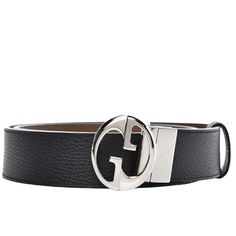 The Gucci reversible belt boasts an alluring combination of black and brown leather. Crafted from 100% flat grain calf-skin leather, the 1.5-inch band is finished with a palladium buckle in silver color. Boasting the iconic GG interlocking logo, this belt is made in Italy and is best cleaned with a dry cloth. Available in multiple sizes, this luxurious accessory is an essential addition to any fashionista's wardrobe. 100% Leather Buckle closure Dry Cloth Clean Gucci style 449715 Reversible Black Gucci Designer Black Belt Buckles, Gucci Black Luxury Belt, Luxury Black Gucci Belt Buckles, Designer Black Belts With Gold-tone Logo Plaque, Luxury Black Belt With Gold-tone Hardware, Gucci Style, Reversible Belt, Gucci Accessories, Gucci Fashion