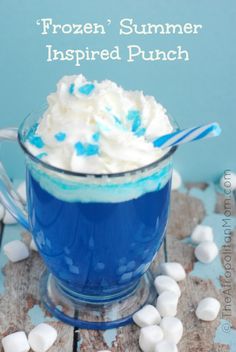 frozen summer inspired punch in a glass with marshmallows