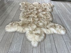 an animal skin rug is on the floor