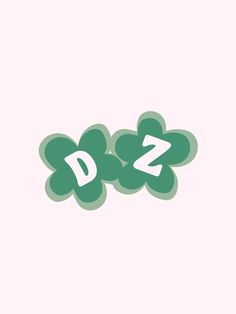 the letter d is made up of green leaves and letters that spell it's name