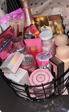 a basket filled with lots of different types of cosmetics and personal care products on top of a table