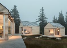 two small wooden cabins sitting next to each other