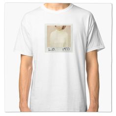 a white t - shirt with an image of a woman's face