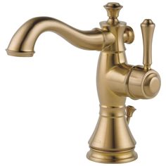 an antique brass faucet with the handle extended