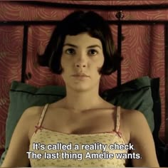 a woman laying in bed with her eyes closed and the caption reads, it's called a reality check the last thing amelie wants