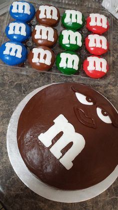 a chocolate cake with m and m on it