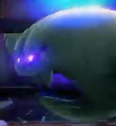 a blurry image of a white polar bear with purple eyes