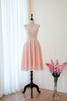 Pink Bridesmaid Midi Dress, Pink Square Neck Prom Dress, Feminine Square Neck Dress For Wedding Guest, Pink Backless Midi Dress For Garden Party, Summer Bridesmaid Dress With Square Neck, Feminine Bridesmaid Midi Dress With Square Neck, Feminine Square Neck Midi Bridesmaid Dress, Elegant Pink Backless Sleeveless Dress, Feminine Square Neck Midi Dress For Bridesmaids