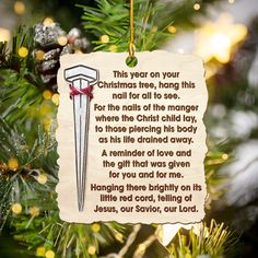 an ornament hanging from a christmas tree with a poem on it that reads, this year on your christmas tree, having this nail all to see