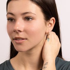 Aqua Chalcedony Pendulum Gemstone Spikes on 15k Gold Filled Huggie style earring - Minimalist, Elegant, Handmade jewelry gifts for her, wife Gemstone: Genuine Aqua Chalcedony Gemstones: 19x5mm approximately Bezel: Vermeil Gold (14k Gold over Sterling Silver) Hoops Material: 14K Gold Filled Hoop Diameter: 13mm Hoop Width: 2mm Closure: FlexCatch Note that due to the handmade nature of these genuine stones, measurements are approximately and might vary slightly for each stone. Arrives in giftbox. M Minimalist Long Drop Pierced Earrings, Modern Gemstone Drop Earrings, Modern Gemstone Drop Earrings Jewelry, Minimalist Dangle May Birthstone Jewelry, Modern Crystal Earrings As A Gift, Minimalist May Birthstone Dangle Jewelry, Minimalist Gemstone Dangle Jewelry, Modern Long Drop Gemstone Jewelry, Modern Earrings With May Birthstone Gemstone