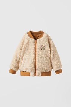 REVERSIBLE FLEECE BOMBER - Light camel | ZARA United States Zara Beige Cotton Tops, Winter Cotton Tops By Zara, Zara Cotton Tops For Winter, Beige Zara Tops For Layering, Zara Portugal, Long Socks, Plain Tshirt, Sleeveless Tshirt, Metallic Thread