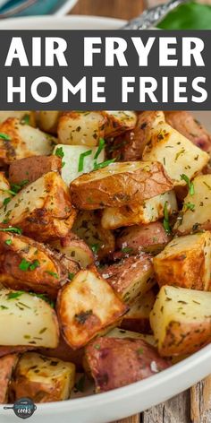 air fryer potatoes in a white bowl with text overlay that says air fryer home fries