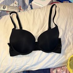 Never Worn Size 36d Black Underwire Bra For Night Out, Black Stretch Bra With Padded Cups, Black Padded Cup Bra, Black Padded Bra For Night Out, Black Padded Party Bra, Black Push-up Bra For Evening, Black Party Bra With Padded Cups, Black Stretch Bra With Lined Body, Black Stretch Bra Partially Lined