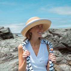 Our signature Sconset hat now offers a chic and classic grosgrain bound edge option in either white or black. It features an oval crown and upturned, asymmetrical brim (longer in the front than the back) which can be worn up or down for ultra versatility and sun protection. Material Our thin leghorn straw is hand-braided and then lock-stitched and blocked into shape. This is our stiffest straw. Bound Edge An optional white or black grosgrain bound edge is sure to make this style pop. Trim Ships Panama Hat, Sun Protection, Straw, This Is Us, Braids, Crown, Trim, Ships, Sun