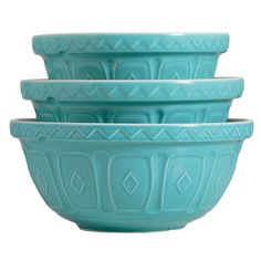 four bowls stacked on top of each other in turquoise green color with geometric designs and diamond shapes