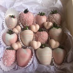 chocolate covered strawberries are arranged in a box