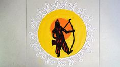 a painting on the wall with a person holding a bow and arrow in front of an orange sun