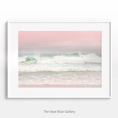 the sky blue gallery's website page is displayed in front of an empty white frame