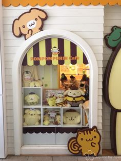 there is a small store with stuffed animals in it