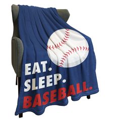 a baseball blanket with the words eat sleep baseball on it and an image of a ball