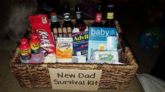 a new dad survival kit in a wicker basket