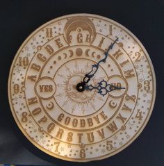 a clock that has some writing on it