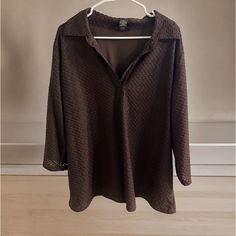 This Blouse Features A Flattering V-Neckline And 3/4 Sleeves, Making It Perfect For Any Occasion. The Blouse Comes In A Rich, Chocolate Brown Color And Has A Textured Finish For Added Visual Interest. It Is A Great Addition To Any Wardrobe And Can Be Dressed Up Or Down Depending On Your Preference. Don't Miss Out On This Stylish And Comfortable Blouse! Please Let Me Know If You Have Any Questions! Approx Measurements: Chest (Pit To Pit): 28" Length:31" Stretch 3/4 Sleeve Blouse For Work, Stretch Blouse With 3/4 Sleeves, Stretch Blouse With 3/4 Sleeves For Work, Stretch 3/4 Sleeve Tops For Work, Brown 3/4 Sleeve Blouse For Fall, Comfortable Blouses, Chocolate Brown Color, Chocolate Brown Colour, Brown Texture