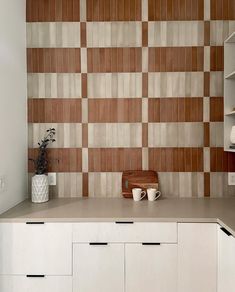 the kitchen counter is clean and ready to be used as a storage area for dishes