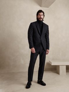 Timeless tailoring, this exquisite black tuxedo jacket offers elevated style to last a lifetime.  Made from Italian virgin wool, our designers employed a classic Barathea weave, a sharp roped shoulder construction and our tailored slim fit for a natural look that's especially polished.  Ottoman pockets finish the look with understated sophistication.  TAILORED SLIM FIT: More relaxed than our Slim Fit, our designers spent 3 years to refine the fit of this Italian cut, with a slightly softer shoul All Black Mens Outfit Formal, All Black Tuxedo For Men, All Black Suit Men, Suit With Turtleneck, Birthday Dresscode, Black On Black Suit, Suite Men, Mens Black Suit, Italian Tuxedo