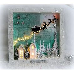 a christmas card with a santa sleigh flying through the sky