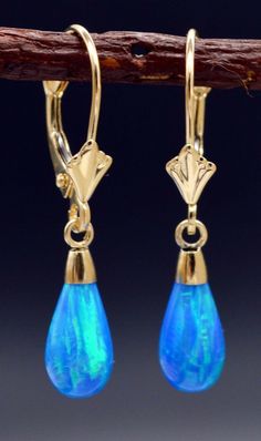 These 14K Solid Yellow Gold Tear Drop Blue Fire Opal Leverback Dangle Earrings can show you a variety of different combinations. We use high-quality accouterments to show a beautiful appearance. All the earrings are completed with 14K gold. It can be used as one of the choices for long-term use. You can use these Dainty earrings on some special days ( similar to anniversaries, Christmas, Valentine's Day, Mother's Day, and Thanksgiving Day). Specifications Metal 14k Solid Yellow Gold Style Opal L Blue Drop Earrings With Lever Back, Elegant Blue Jewelry With Lever Back, 14k Gold Blue Dangle Earrings, Blue 14k Gold Dangle Earrings, Blue Fire Opal, Turquoise Hoop Earrings, White Gold Earrings Studs, White Gold Studs, Leverback Earrings