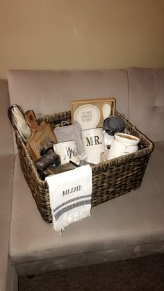 a wicker basket filled with personal care items on a couch in a living room