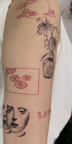 a woman's arm with tattoos on it, including an image of a face and flowers