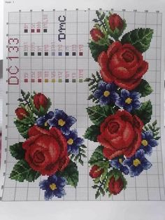 two cross stitch roses with blue and red flowers on them, next to each other