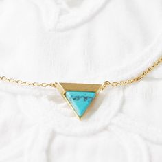 Lovely and tiny gold framed turquoise marble stone triangle pendant necklace is great to wear for everyday or special occasions . Materials Gold plated Turquoise stone Size Charm size : 10 mm Chain Length : 16 '' ( AS PICTURED ) You can CHOOSE your chain length 15 - 18 INCHES before check out ! * necklace sizes * 15 inches: around neck 16 inches: standard short 17 inches: average length 18 inches: standard long CAUTION - We do not recommend to buy it if you have allergic and sensitive skin - Do Gold Adjustable Minimalist Turquoise Necklace, Dainty Triangle Jewelry For Gifts, Adjustable Minimalist Gold Necklace, Minimalist Adjustable Gold Turquoise Necklace, Dainty Triangle Jewelry Gift, Gold Minimalist Turquoise Necklace Gift, Turquoise Triangle Jewelry For Gifts, Turquoise Triangle Jewelry Gift, Turquoise Marble