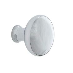 a white door handle with a round knob