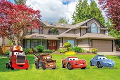 three cars are parked in front of a house with trees and bushes behind them on the lawn